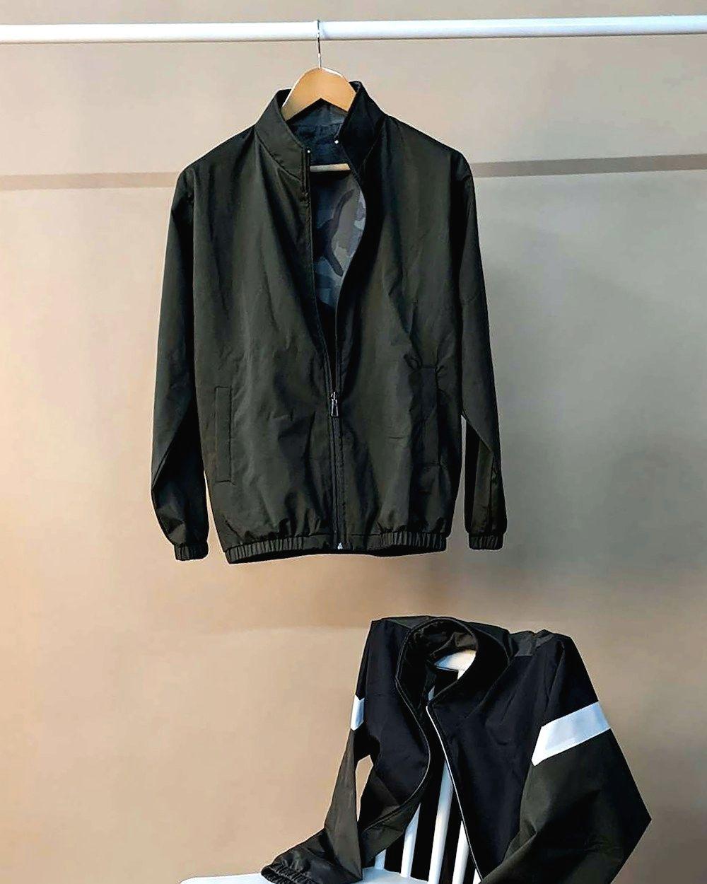 Black zip jacket on a hanger